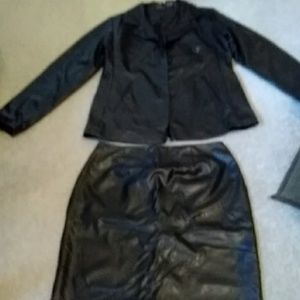 Leather jacket and skirt suit.
